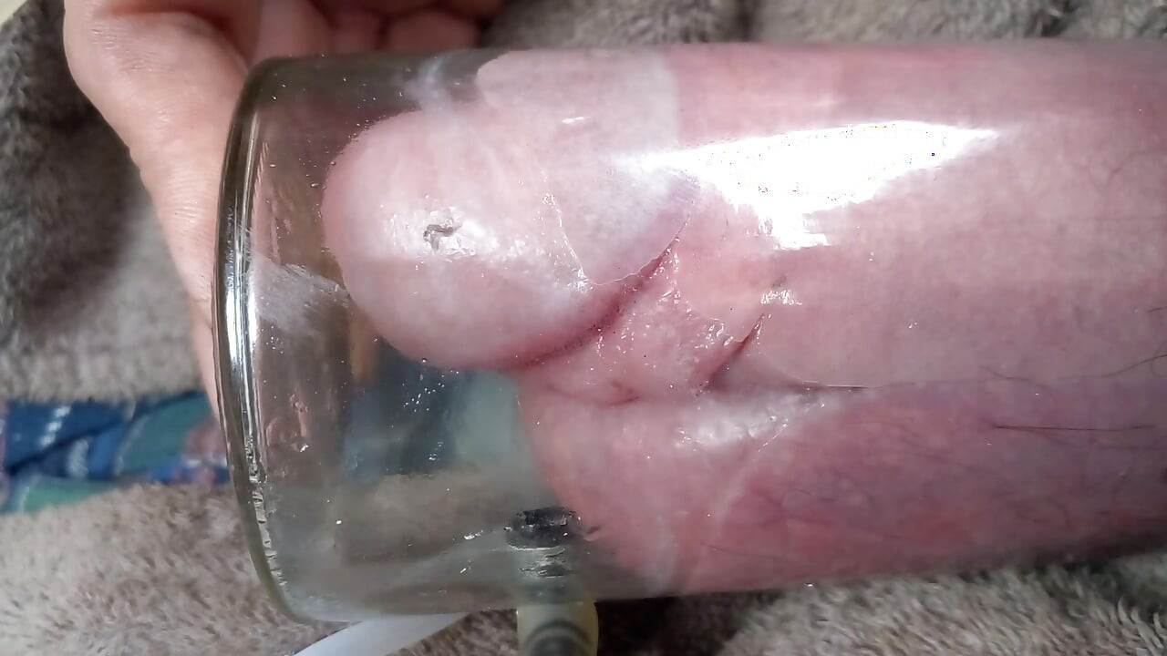 Maxing out the jar with cock and balls