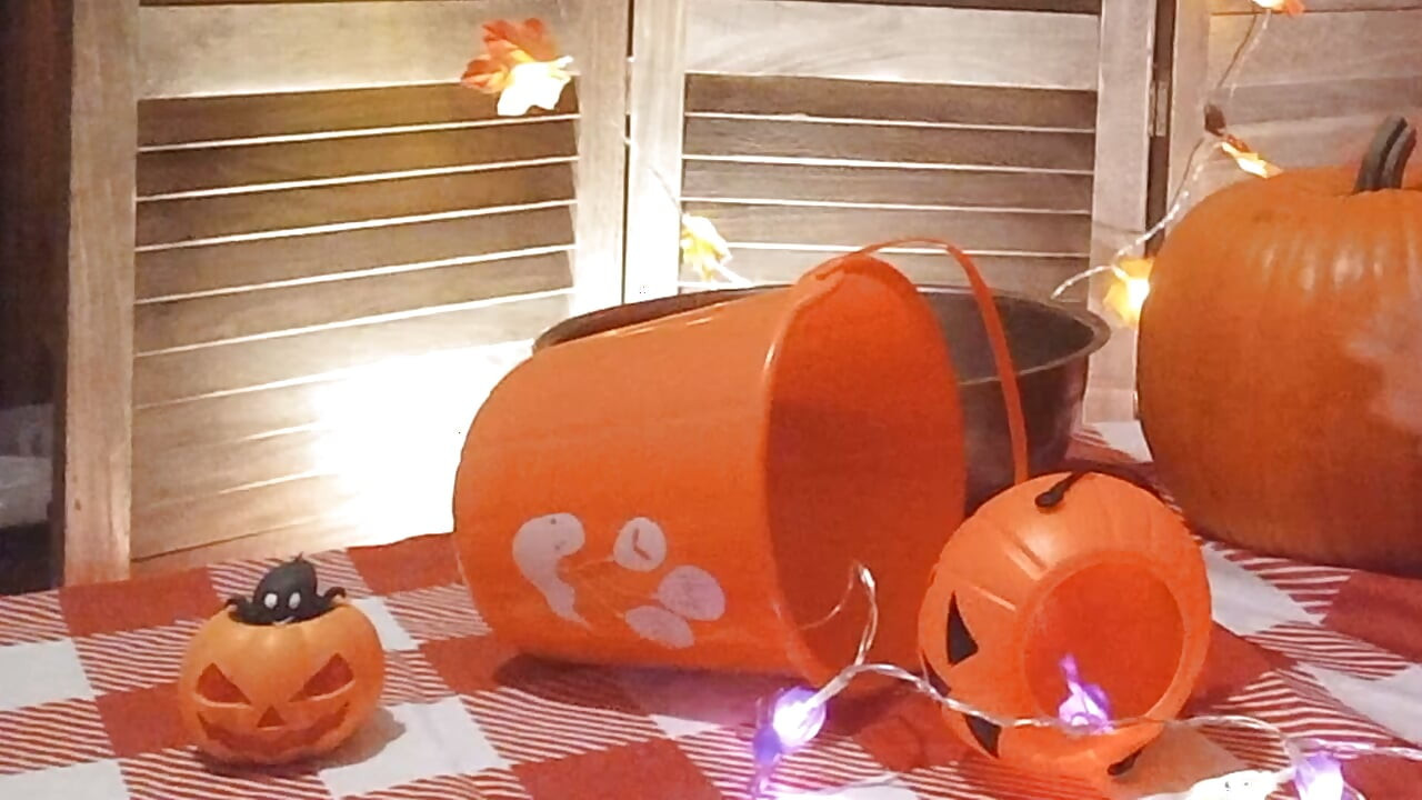 Cute twink Jon Arteen performs a sensual dance while carving a Halloween pumpkin