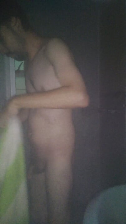 Man Showering with Flashlight On