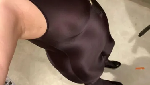 Handjob in black spandex catsuit