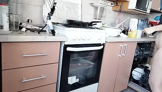 Sexy wife prepares lunch naked in the kitchen.