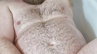 Hairy gay bear pisses and cums hard