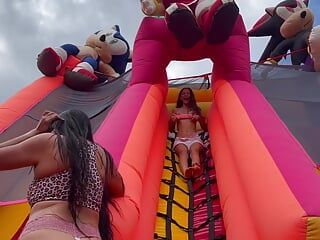 Horny lesbians fucking in a bouncy castle
