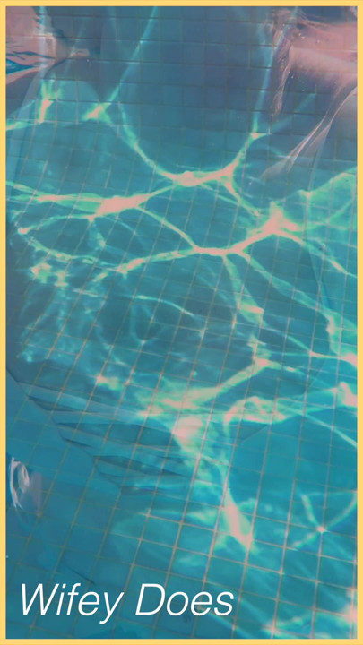 Wifey swims in the pool with perfect body