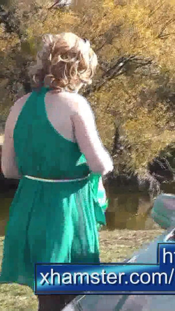 Spectacular moment from "Milf beautiful sexy blonde outdoors on river bank washes car without panties and bra under dress."