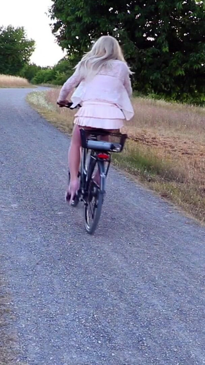 Jaw-dropping moment from "Posed & Wanked In Public - most exciting is biking in short clothes and shiny nylon stockings"