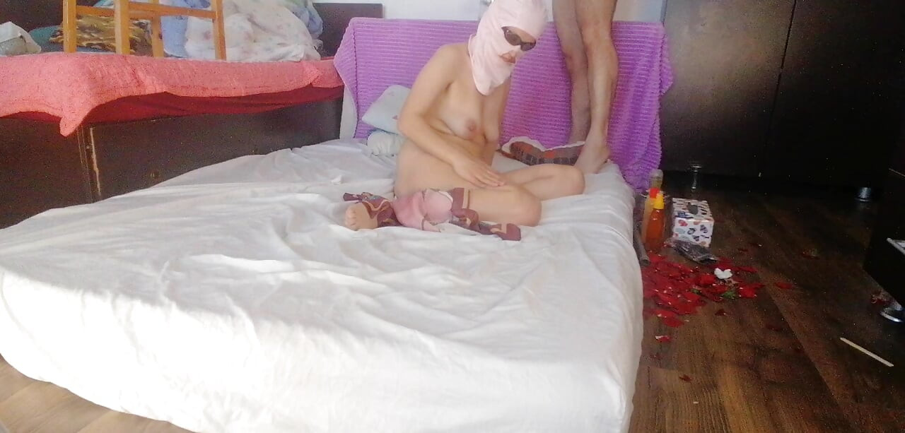 Sensual massage of a hot couple with oil on the body. Foreplay in the bedroom with an amateur couple.