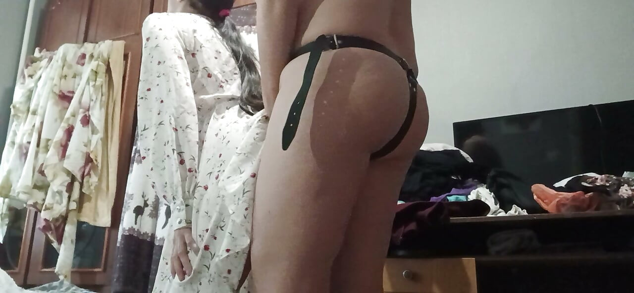 My boyfriend’s mother fucks me with a strap-on under my dress while my boyfriend is taking a bath