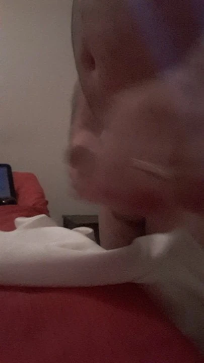 Wanking for Janey into white satin slip