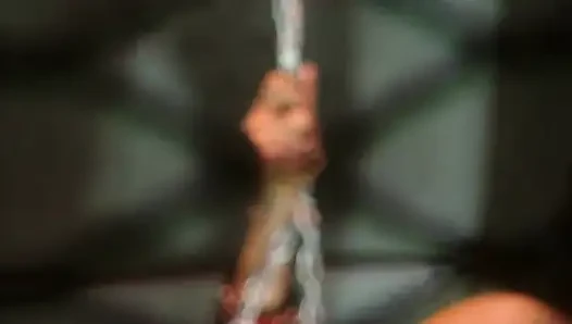 Delivers a steamy blowjob to her slave's cock in a BDSM affair