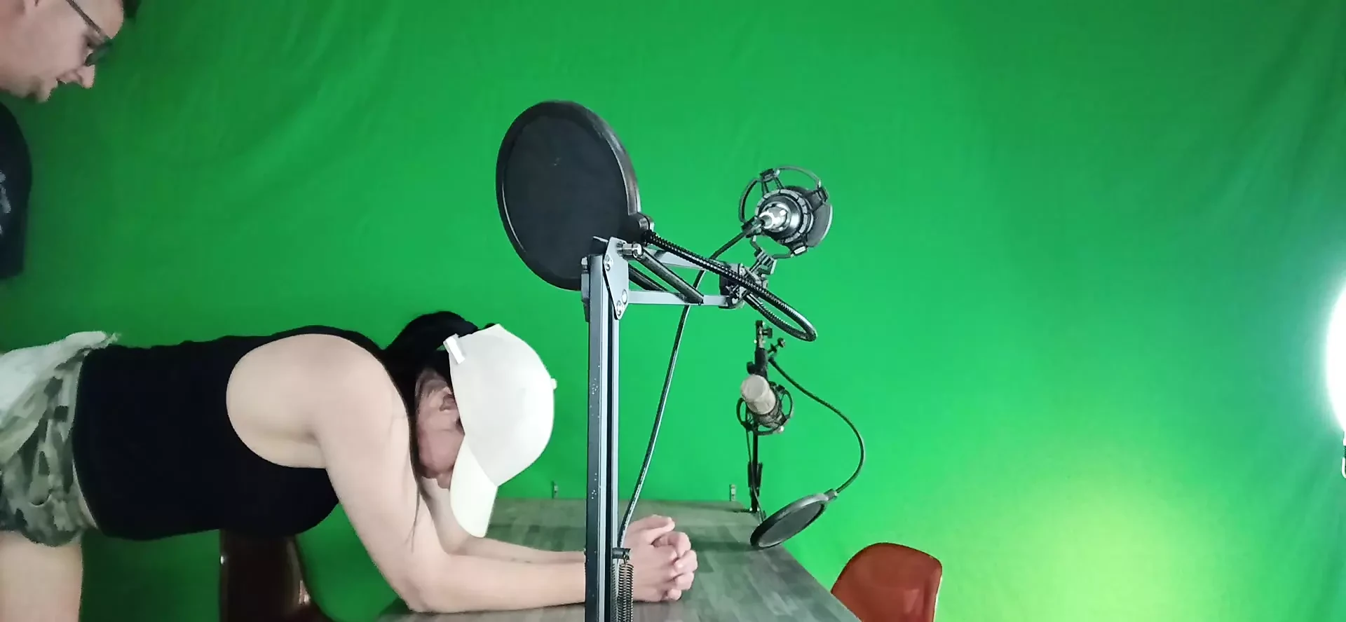 Me and my steps sit in front of the green  screen
