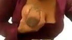 Ebony girl milking her big black tits