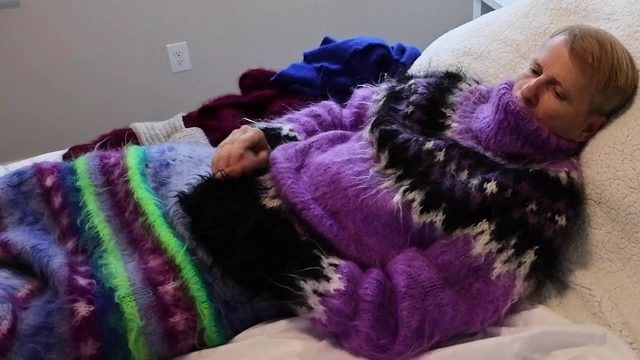 Sweater Fetish Mohair and Angora. In a fleece sweater bed with several of my fetish sweaters for a little fun.