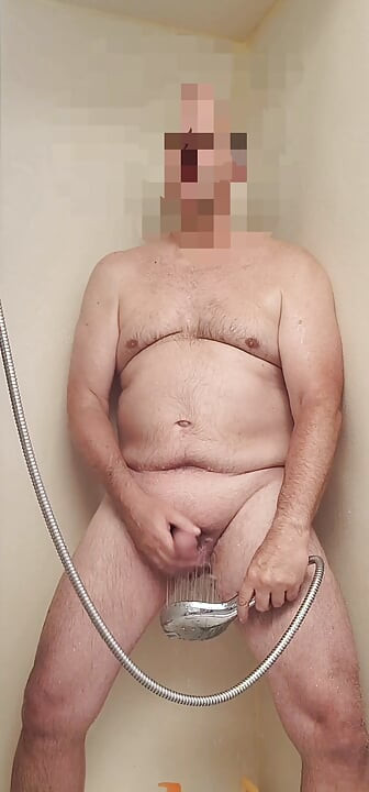 Solo exhibitionist masturbator shower, stroke, cum, swallow