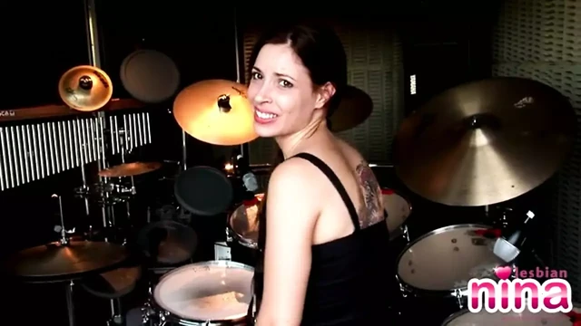 Lesbian Nina Drummer showcasing tits and pussy