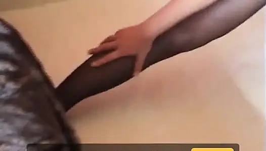 Nyllady Cosplaying a Nylon Mistress