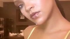 Rihanna selfie showing her big cleavage in a bra