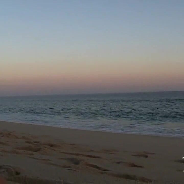 Rachel pleasures herself on the beach