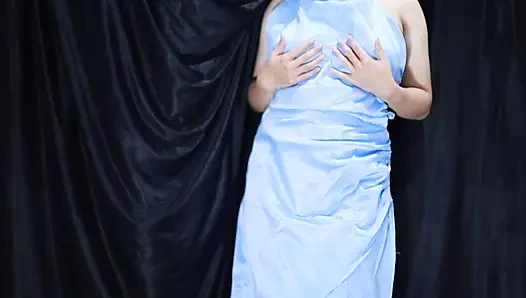 A young girl is trying on a new pair of lingerie