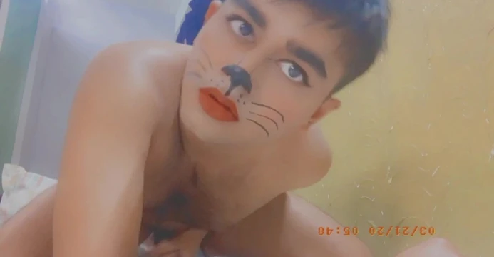 Femboy masturbates in cat face makeup