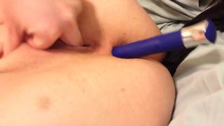 Vibrator in the ass and finger in her pussy