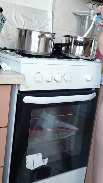 Sexy Latina nude in the kitchen. Sexy naked wife prepares food in the kitchen. | Clip 1