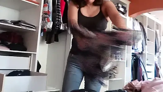 My stepmother tries on jeans while I masturbate, admiring her big ass and hairy pussy.