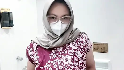 Fountain of a girl in a batik daster dress