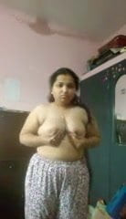 Chubby Indian wife strips