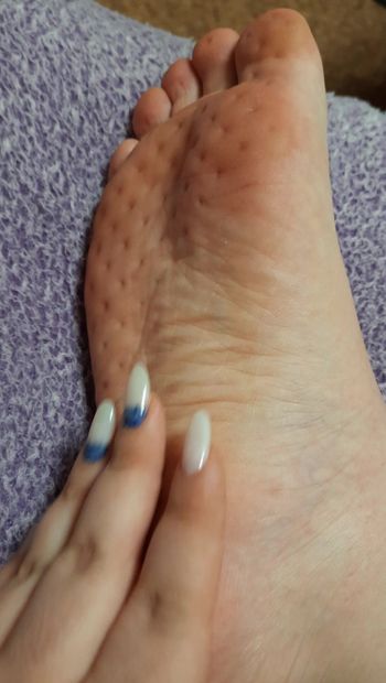 Hot lady's feet  after a sadhu board
