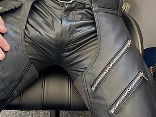 Leather daddy bulging in leather jeans and leather chaps