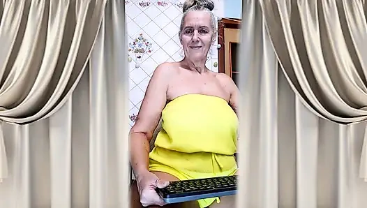 Cheerful Housewife Lukerya Shows Her Bare Feet in Kitchen. Mature Soles and Toes Close Up