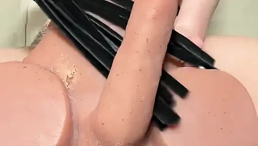 Tattooed BDSM Girl Dominates Dildo With Flogger And Whip