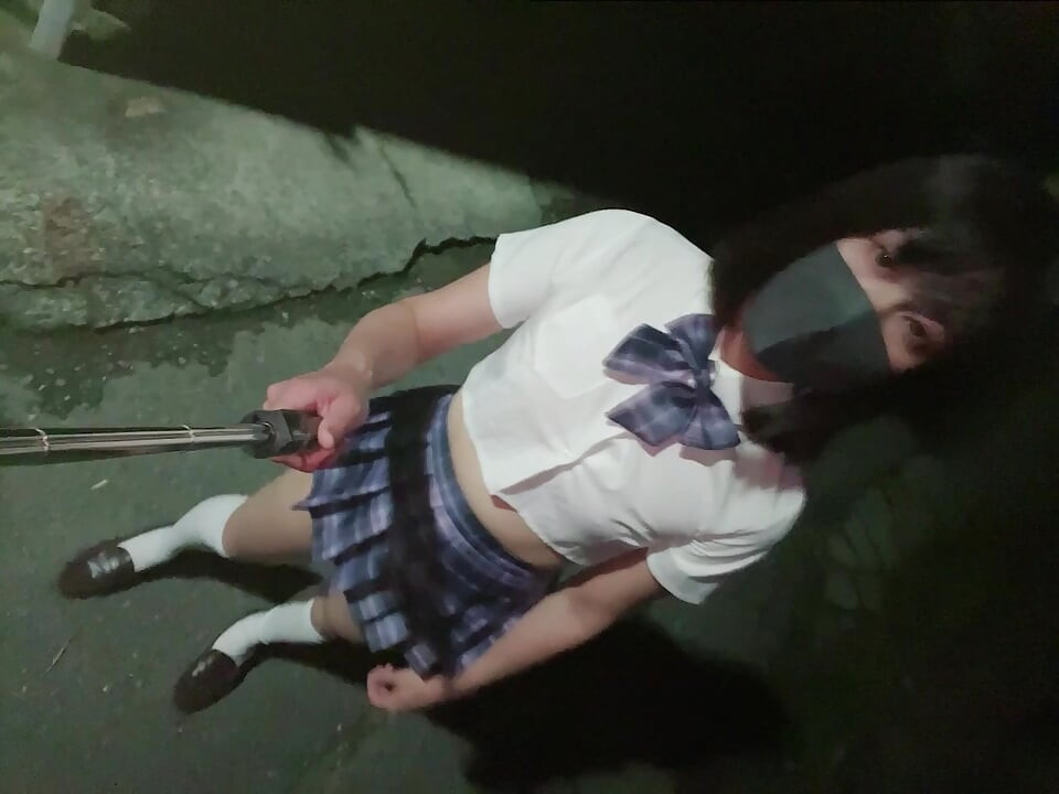 Taking a late-night walk in a miniskirt school uniform