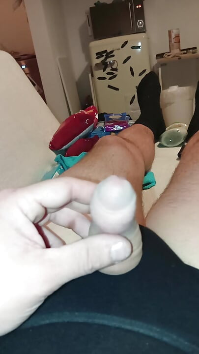 Man in black giving his Slip a white touch