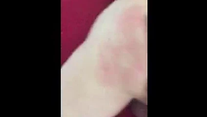 Man getting spanked with hairbrush