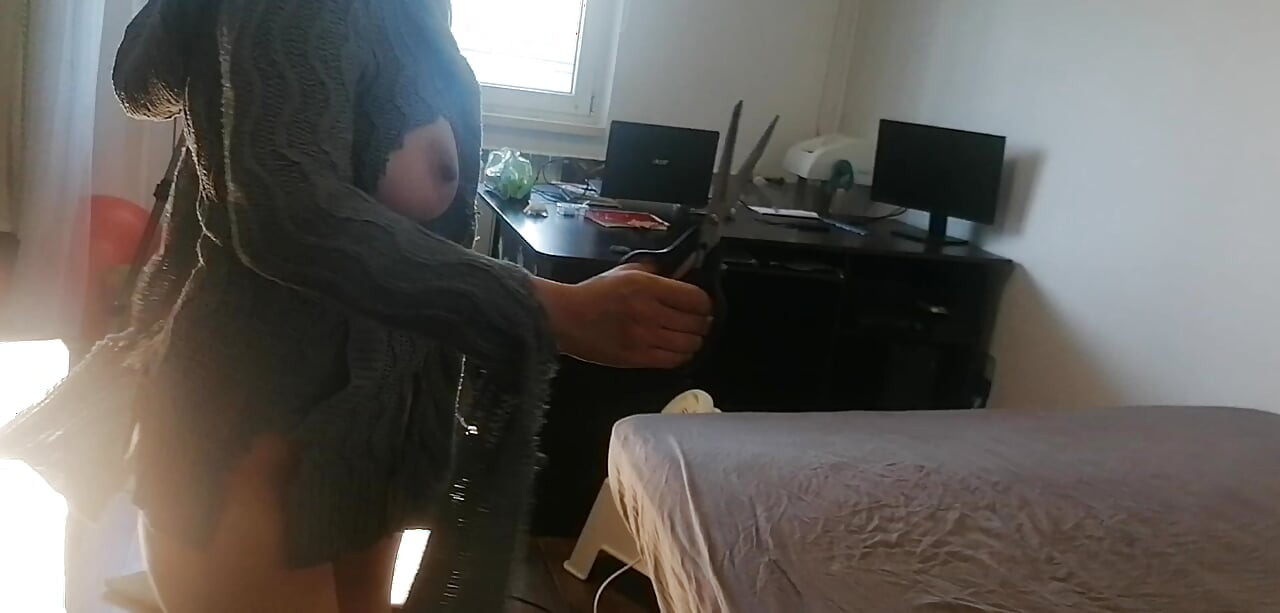 Amateur wife has fun trying on clothes and cutting them. Amateur wife vacuuming naked in the house.