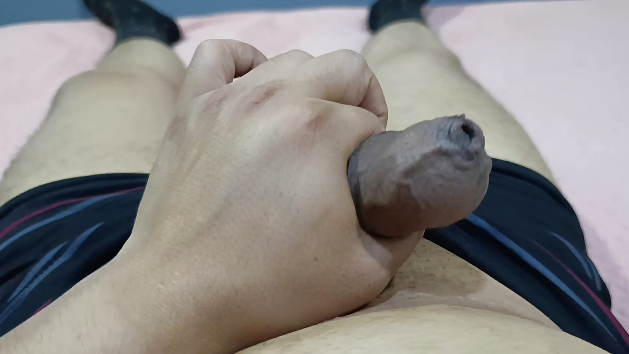 I massage my big cock on the hotel bed at night to really relax.