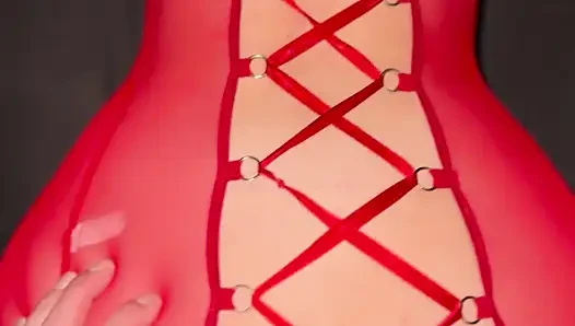 a girl from behind in a bright red outfit