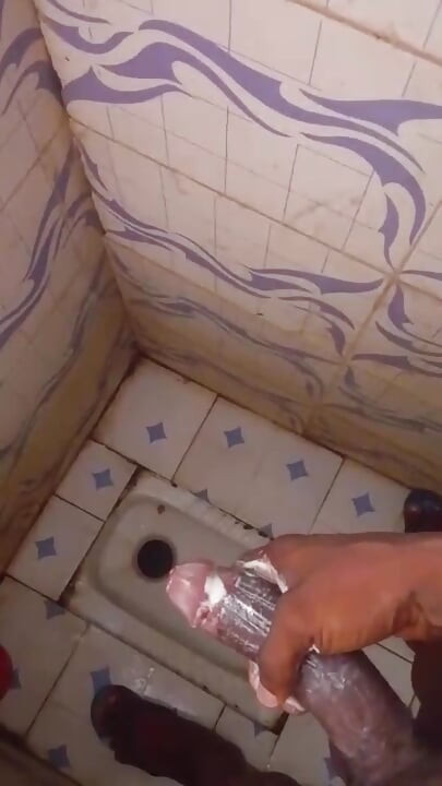 Masturbating Monster Cock in the Bathroom