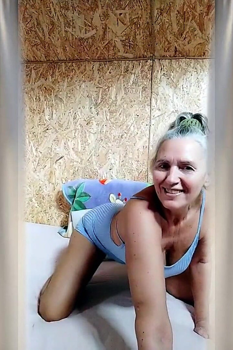 Hot Housewife Lukerya Is Busy Having Fun on a Large Bed.