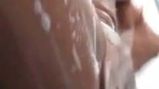 black girl fingering with soap in shower