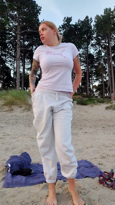 POV. You Watch as a Busty Model, of Your Presence, Strips Naked on the Beach, Bathes, and Plays in the Sand.