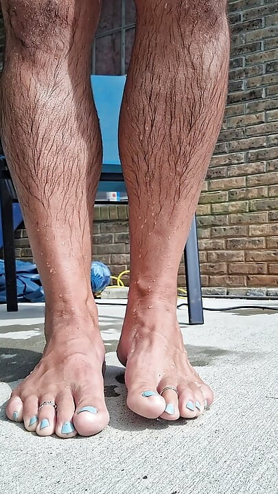 Posing my wet legs and feet by the pool before I jerk off and cum
