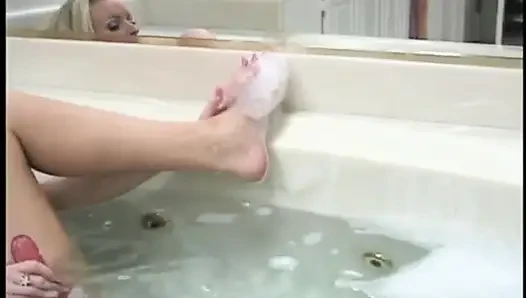 Horny MILF masturbating in the bathroom