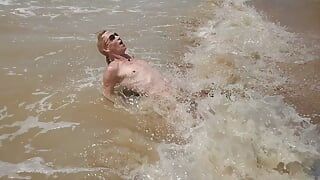 Swimming, splashing and posing naked in the sea...