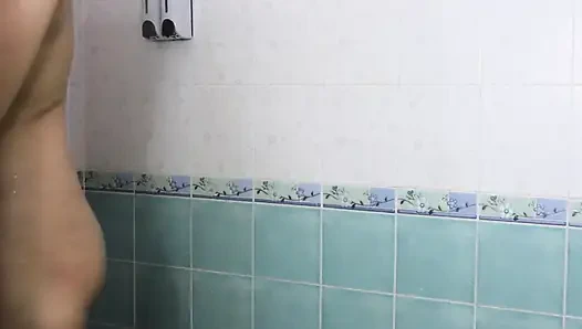 Thai teenager showers, showing off her pink nipples and smooth vagina. Real Thai Solo
