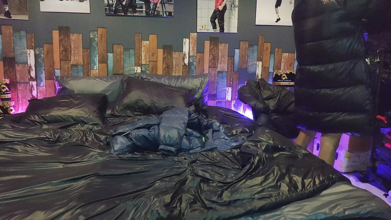 Cock Rubbing Down Jacket on Shiny Nylon Bed