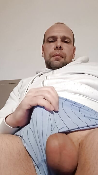Just the balls sticking out. It's really sexy