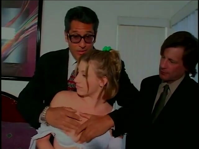 Wide ass blonde coed chick sucks two dudes in suits in bedroom and gets fucked